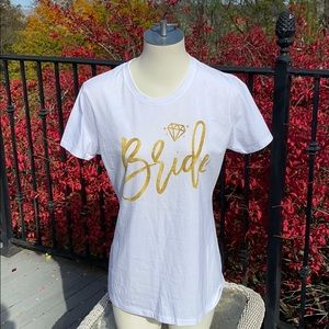 NWOT White Ladies tee with “Bride” in Gold